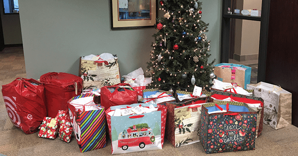 presents under a tree to be donated