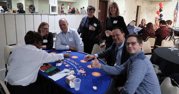 coworkers enjoying each others company at the winter party in 2018 in Madison