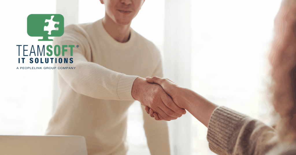 Interviewer and candidate shaking hands.