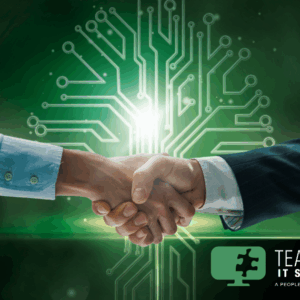 IT professionals shaking hands.